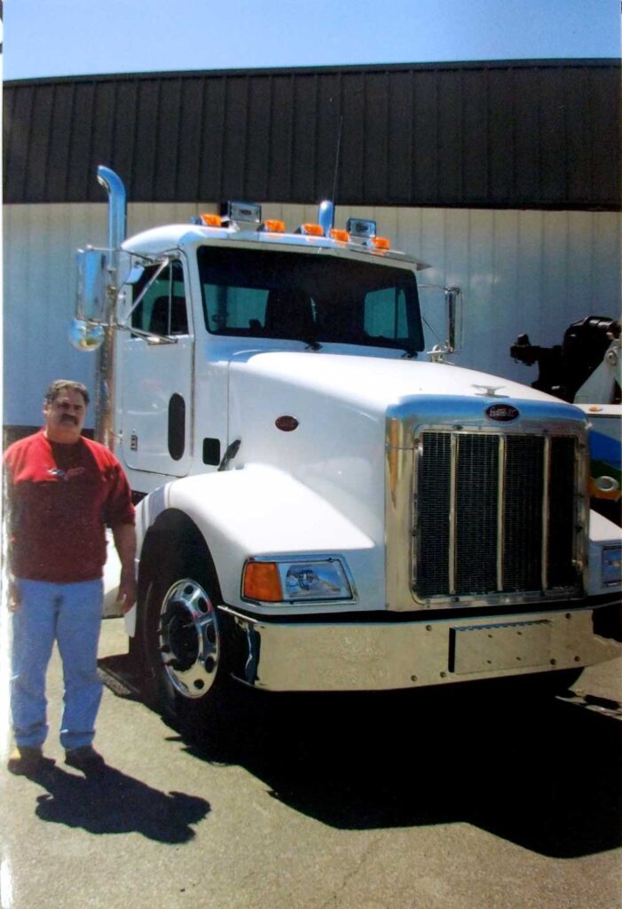 Dick Fogarty and one of the trucks he bought for Comstock